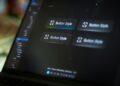 Laptop screen displays four button style options