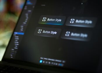 Laptop screen displays four button style options